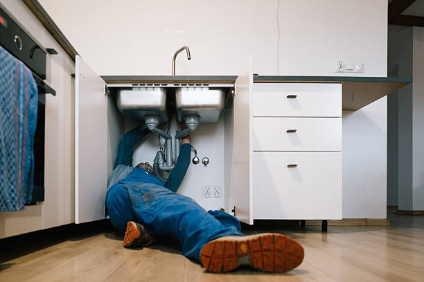 Professional Emergency Plumber technician working in Remsenburg, NY